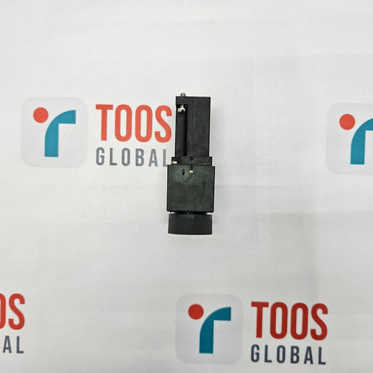 Black cylindrical object on a white background with 'TOOS GLOBAL' branding.