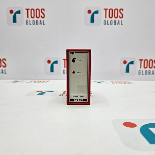 A PR Electronics 2239 power supply unit displayed against a backdrop with the TOOS Global logo.
