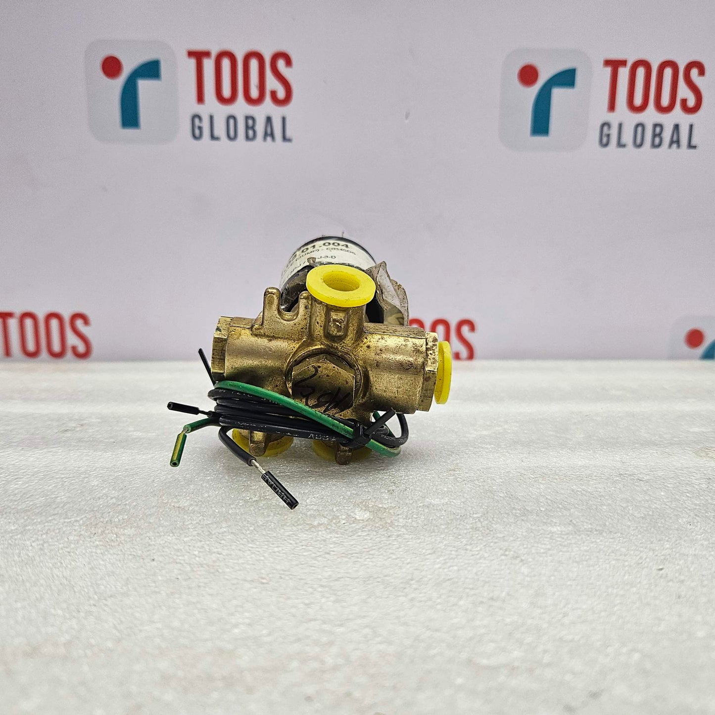 Brass valve with wires on a white background with 'TOOS GLOBAL' branding.