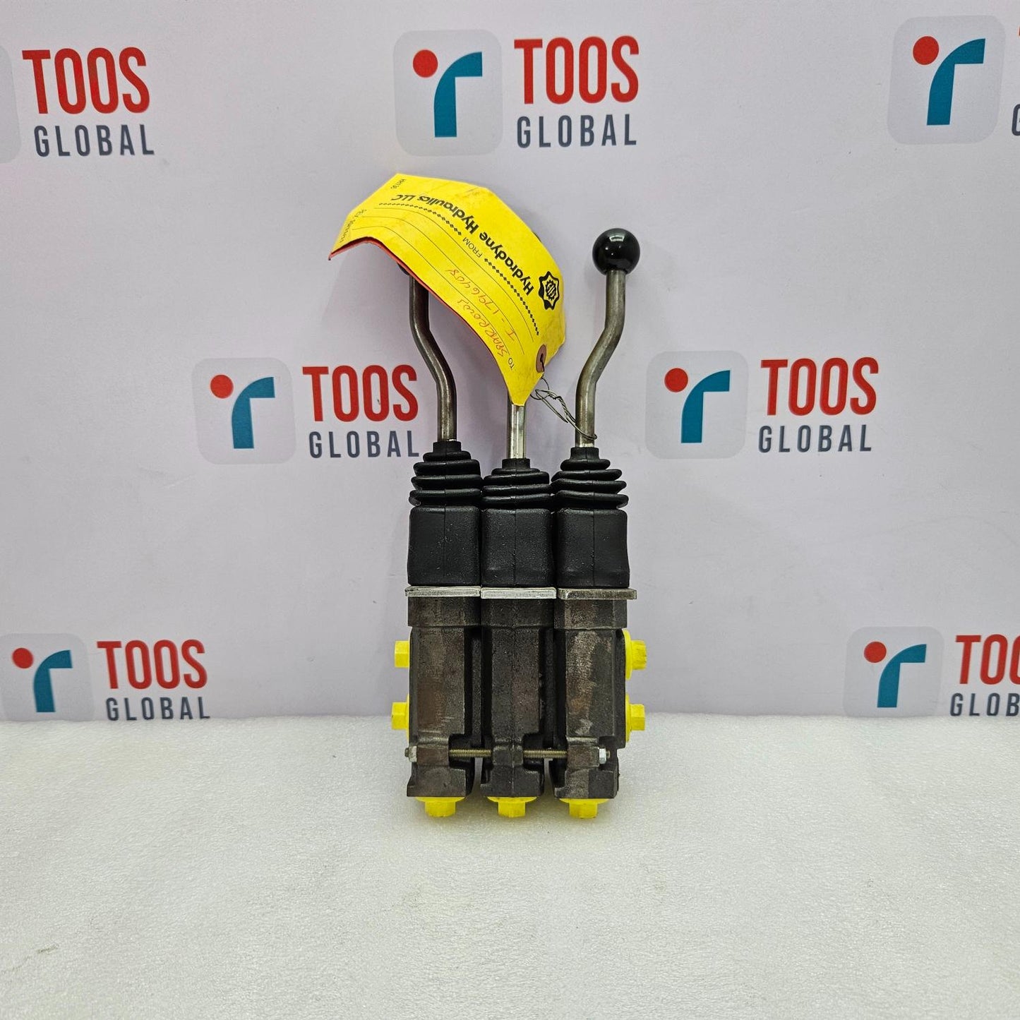 Parker PCL402-06-UT55112 Hydraulic Joystick with yellow cap on a white background with 'TOOS GLOBAL' branding.