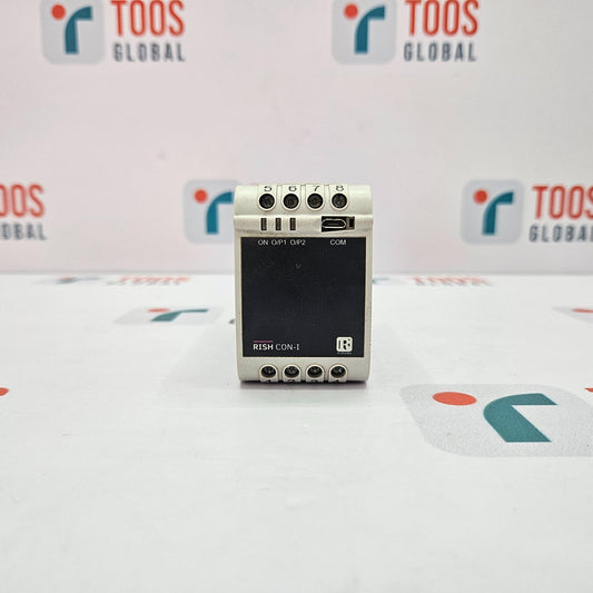 Small electronic device on a white surface with 'TOOS GLOBAL' branding in the background.