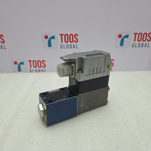 Rexroth 0811404721 SERVO valve on a white surface with 'TOOS GLOBAL' branding in the background.