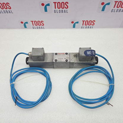 A Rexroth R901351579 4WE6J54/BG12-13NXHCKL/V Valve Hydac EX-1195-200 with two blue cable sensors, displayed on a white surface with a branded background.