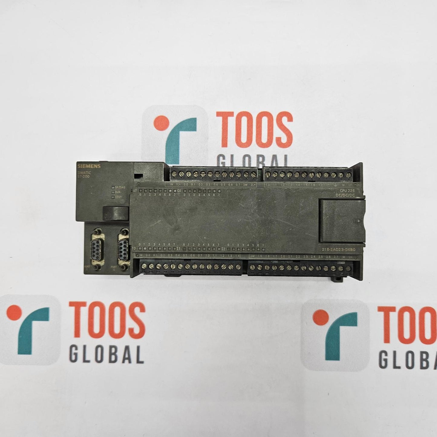 Electronic module on a white background with 'TOOS GLOBAL' branding.