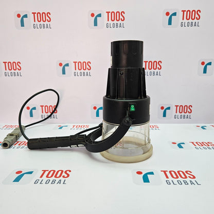 SOLO 424-001 HEAT DETECTOR TESTER 220-240V A SOLO heat detector tester, primarily black and clear in color, with a power cord and a cylindrical shape.