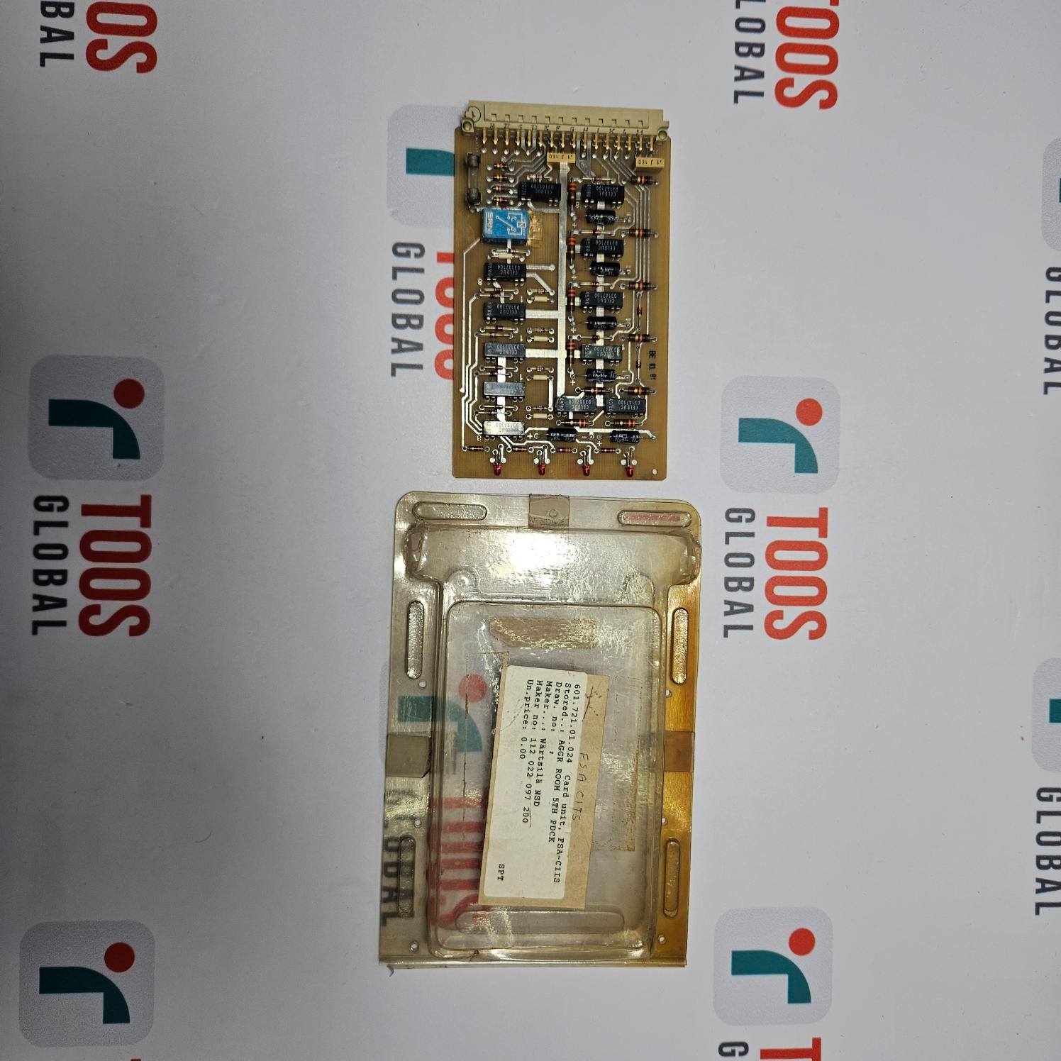 Electronic components in a clear plastic package on a TOOS Global branded background