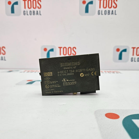 Siemens SIMATIC module on a white surface with 'TOOS GLOBAL' branding in the background.