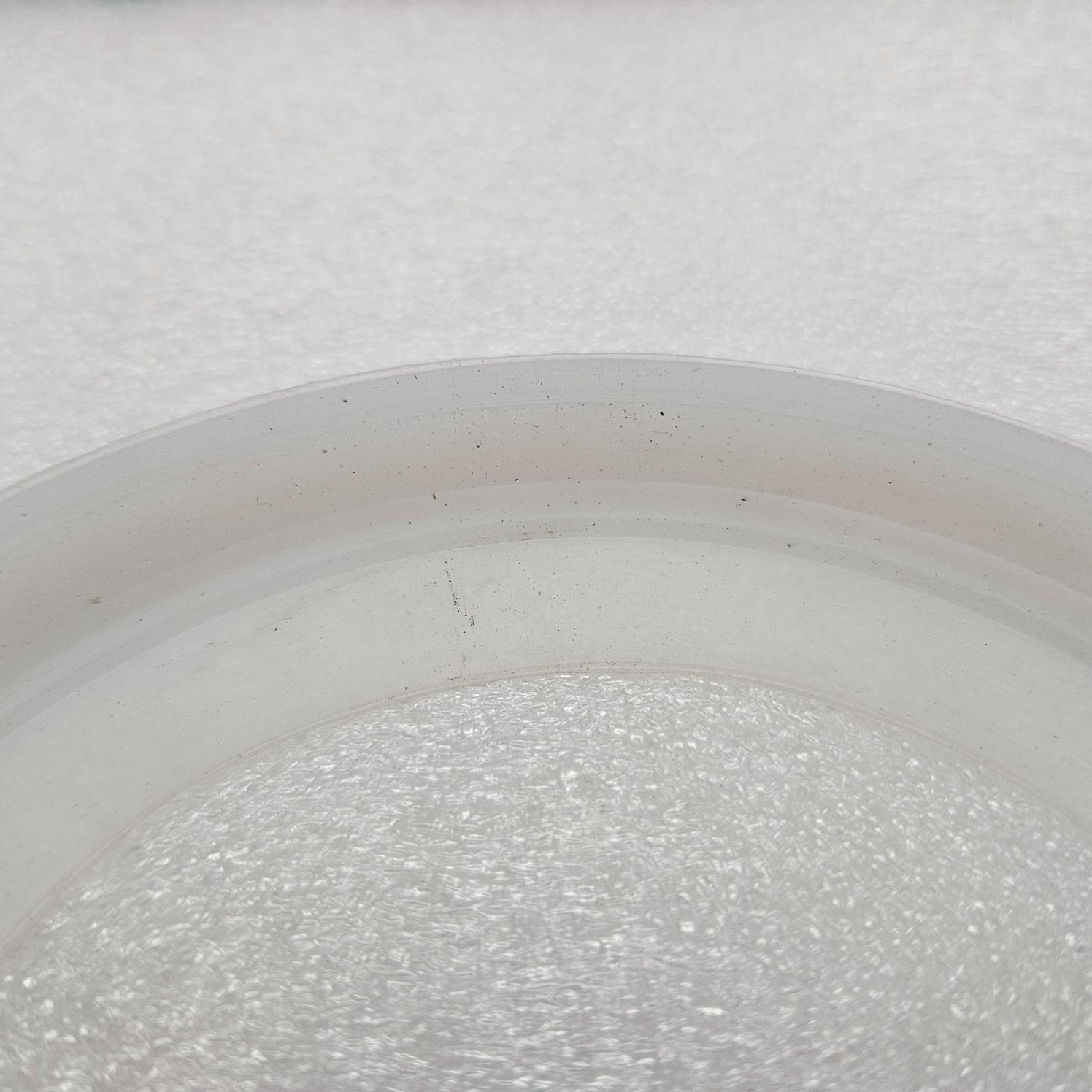 Solo 330 Replacement Silicon Membrane New on a white surface with a blurred background featuring a logo.