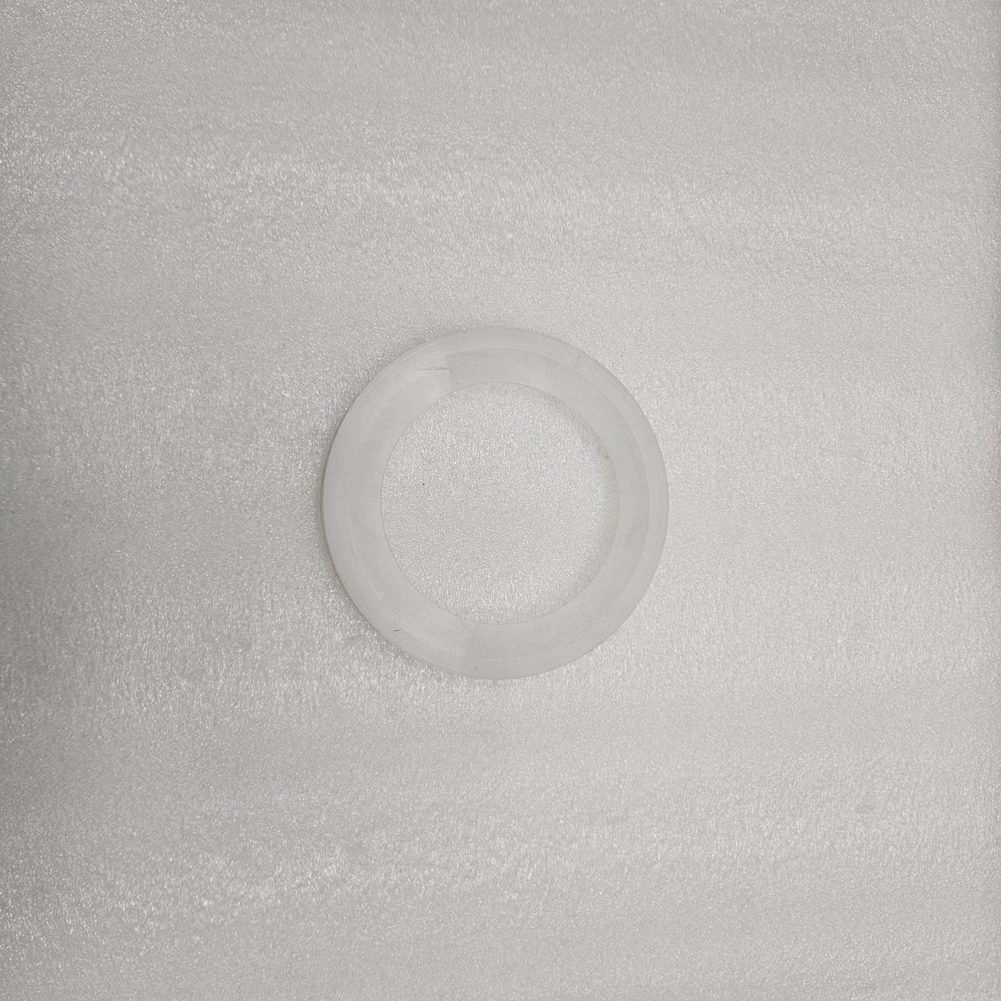 Clear plastic dome on a textured gray background