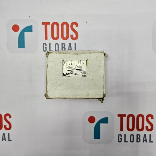 Vintage suitcase with a label on a TOOS GLOBAL branded background