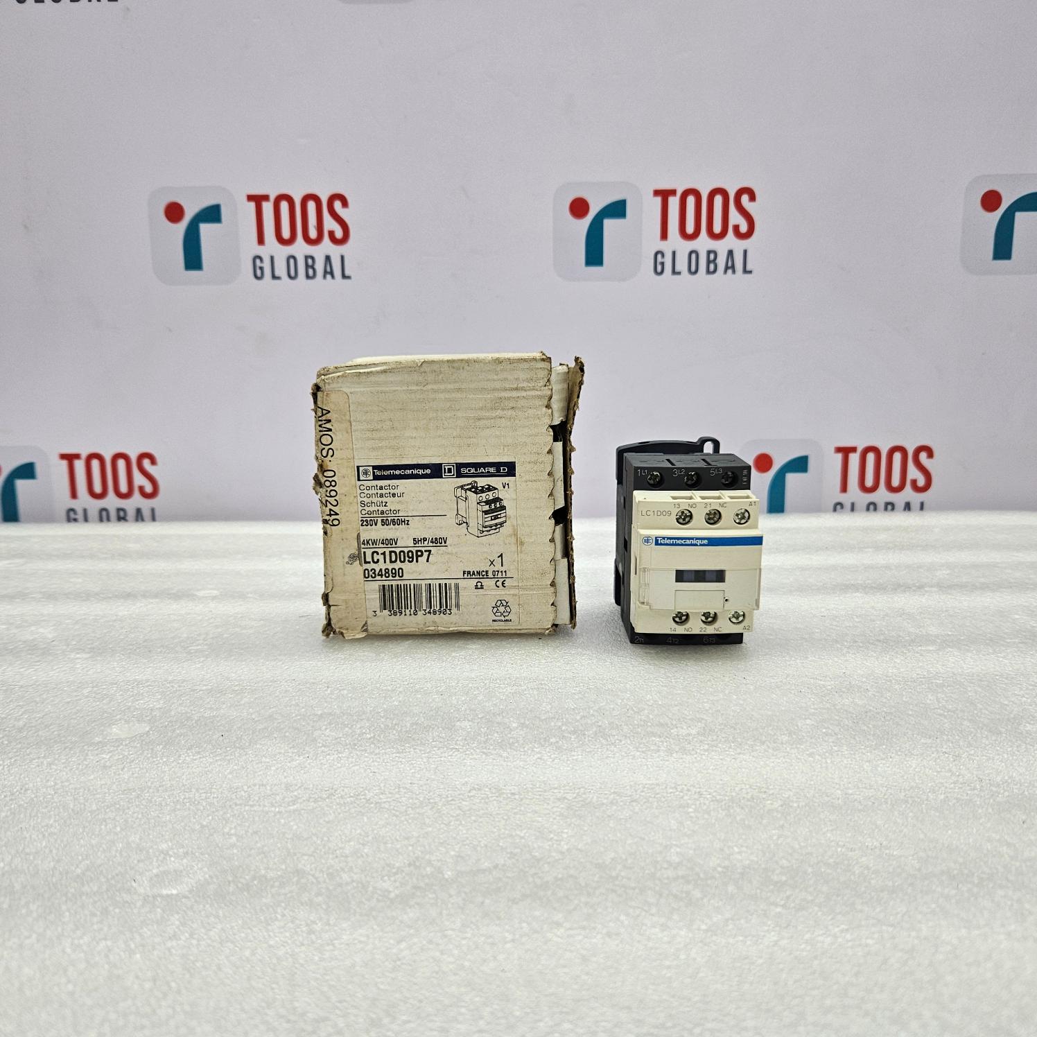 TELEMECANIQUE LC1D09P7 CONTACTOR SQUARE D 230V 50/60HZ Two electrical components on a white surface with 'TOOS GLOBAL' branding in the background.