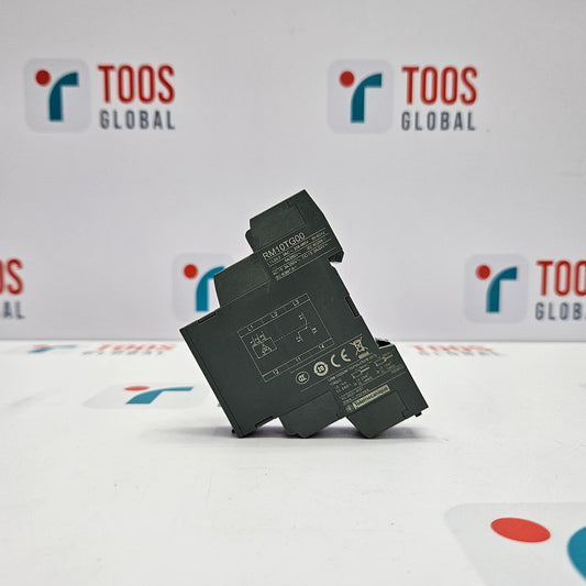A TELEMECANIQUE RM10TG00 control relay on a plain background, primarily black in color.