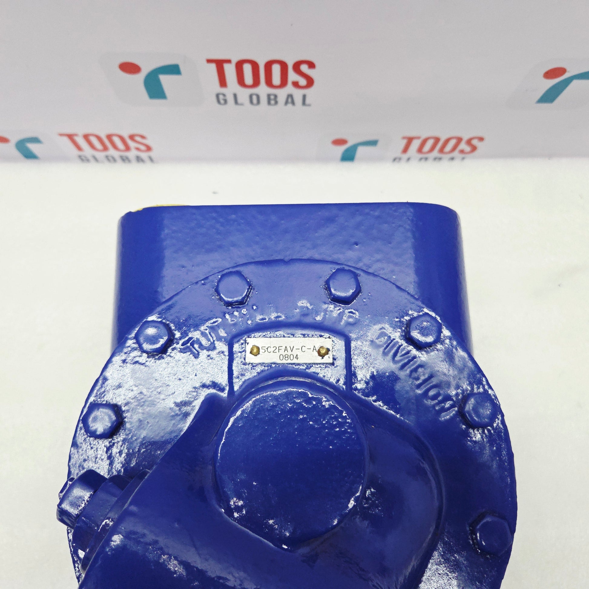 Blue mechanical component with 'TOOS GLOBAL' branding in the background