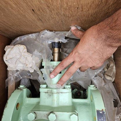Taiko Kikai NHG-10 a valve on a green mechanical component with plastic wrap
