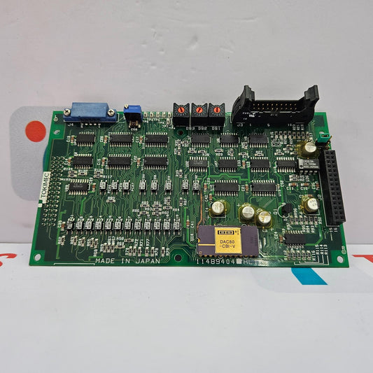Electronic circuit board with various components on a white background