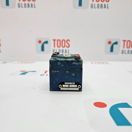 WABCO battery on a white surface with 'TOOS GLOBAL' branding in the background