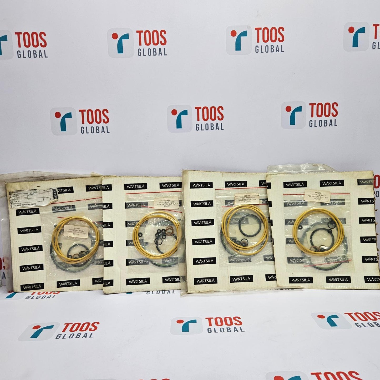 Four packages of mechanical parts on a TOOS GLOBAL branded background