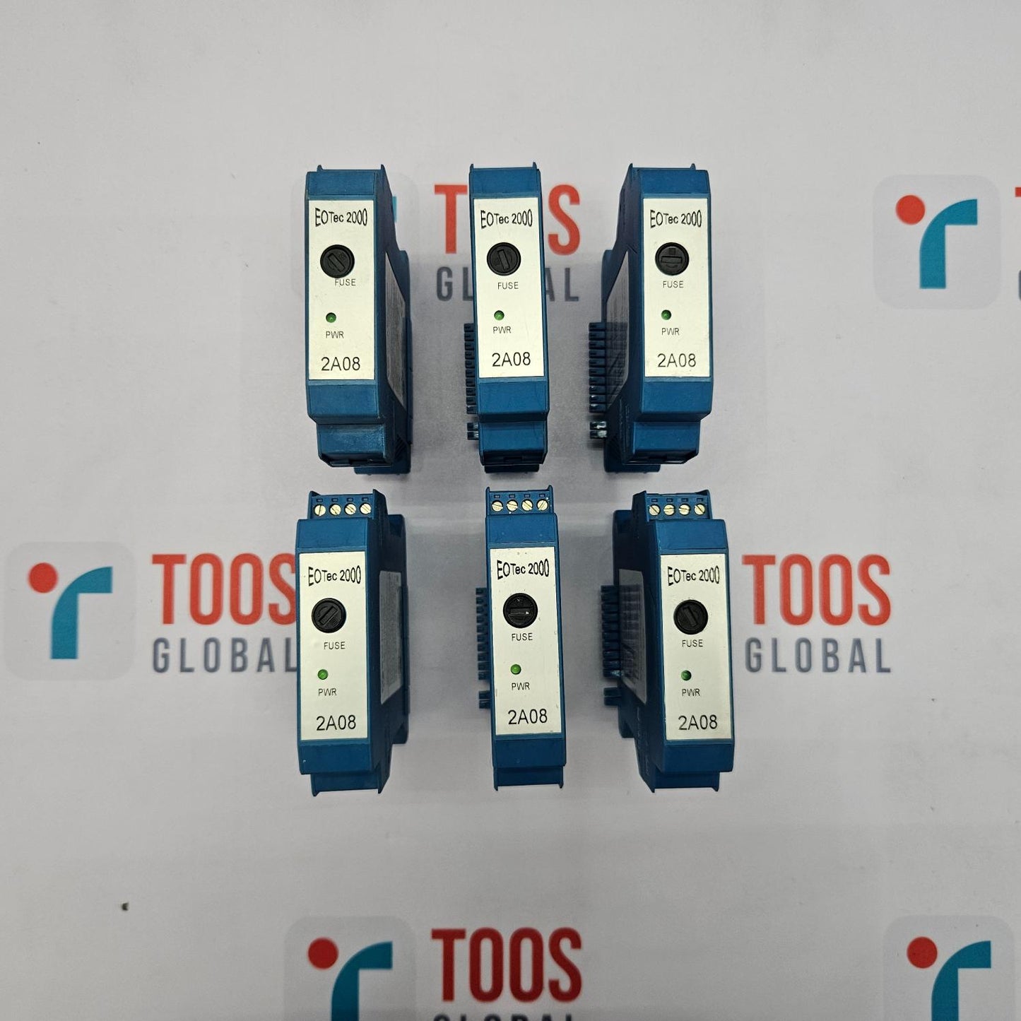 Six ink cartridges with labels on a TOOS GLOBAL branded background
