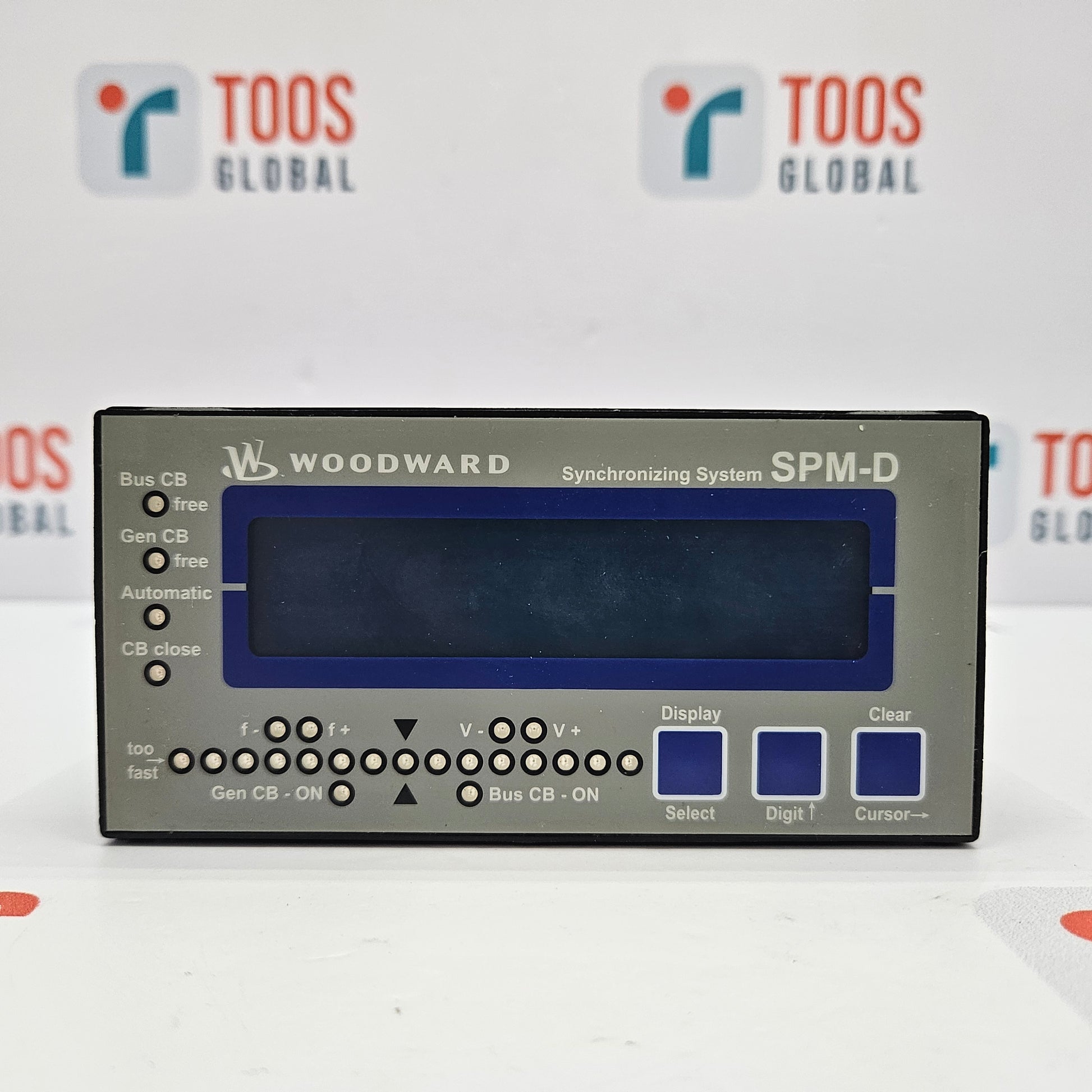 Woodward SPM-D synchronizing system panel with TOOS Global branding in the background