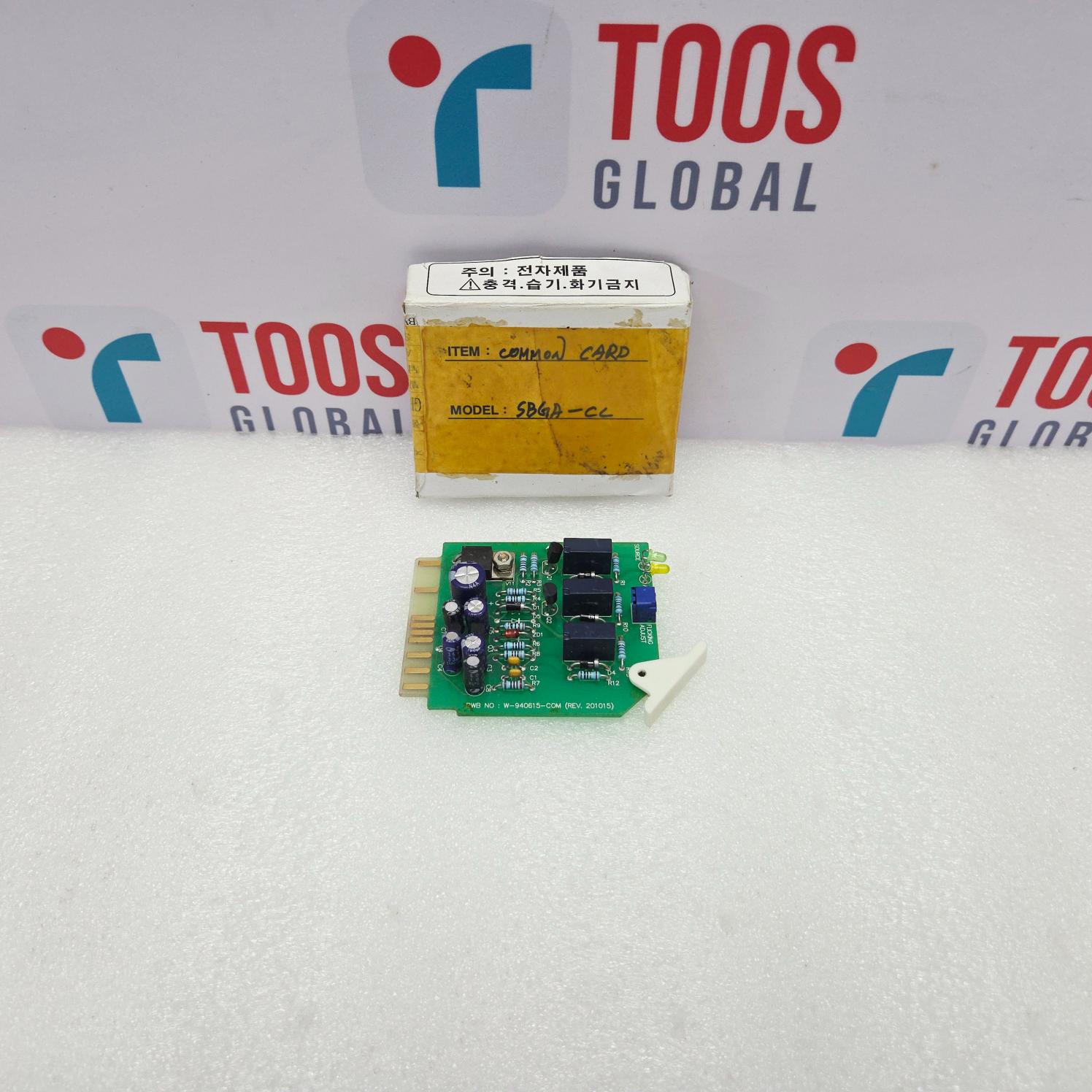 Westronics W-940615-COM circuit board with a small box labeled 'TOOS GLOBAL' on a white background.