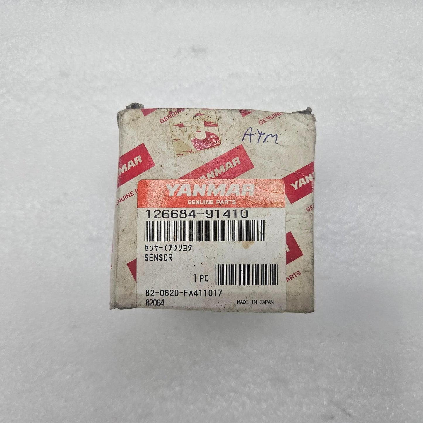 Yanmar 126684-91410 sensor packaging on a textured WHITE background